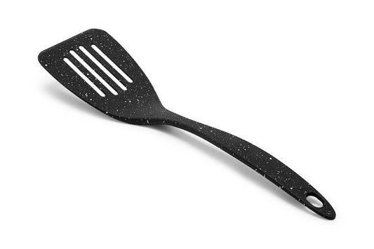 Black speckled spatula on a white background