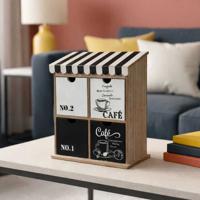Decorative box with black and white design on a coffee table in a living room.
