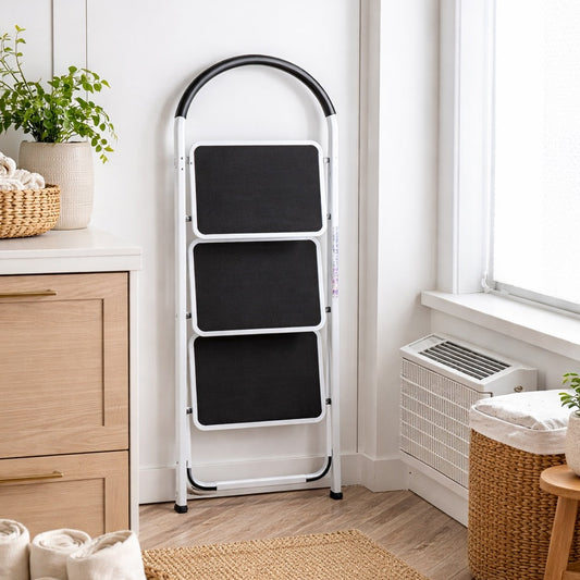 White step ladder in a room with wooden furniture and plants