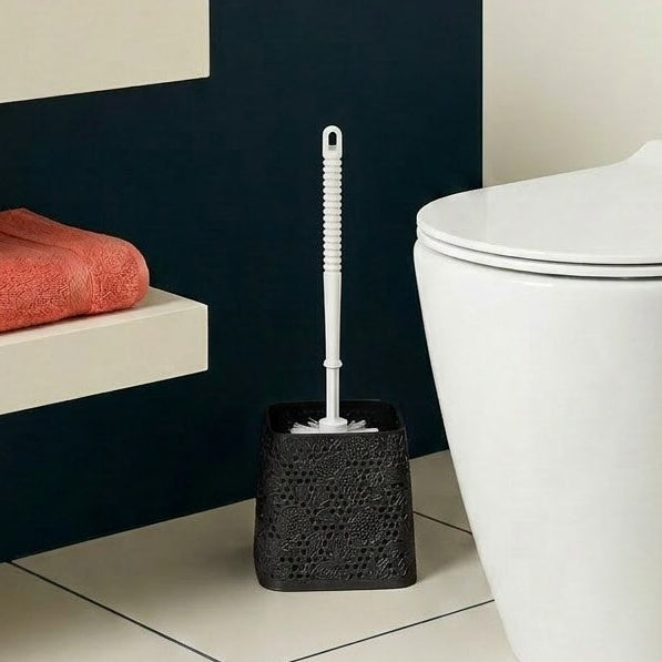 Bathroom with white toilet, blue wall, and black rug.