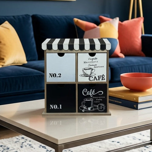 Modern living room with a blue sofa, colorful abstract painting, and decorative items.