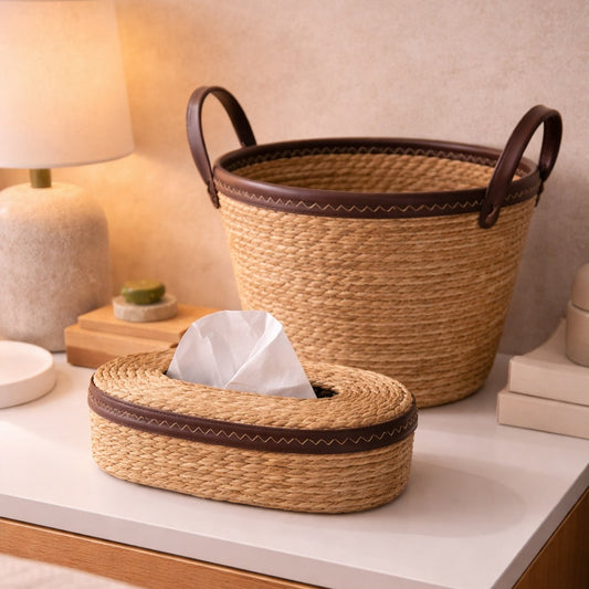 Woven tissue box cover and basket on a nightstand with soft lighting.